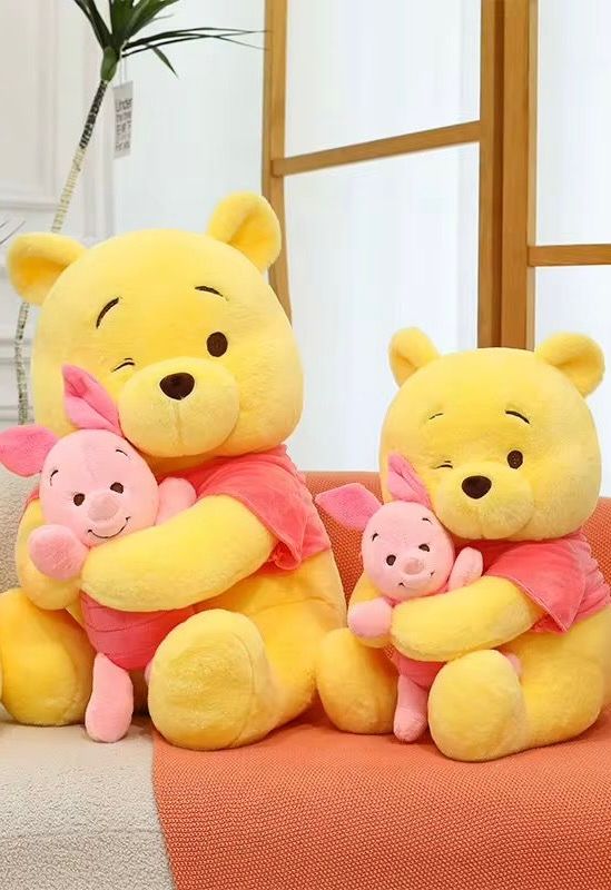 Yellow Bear Holding Pink Pig Plush Toy